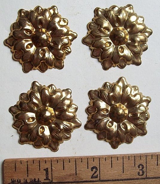 M125 - Brass Trunk Rosettes (4) - Click Image to Close